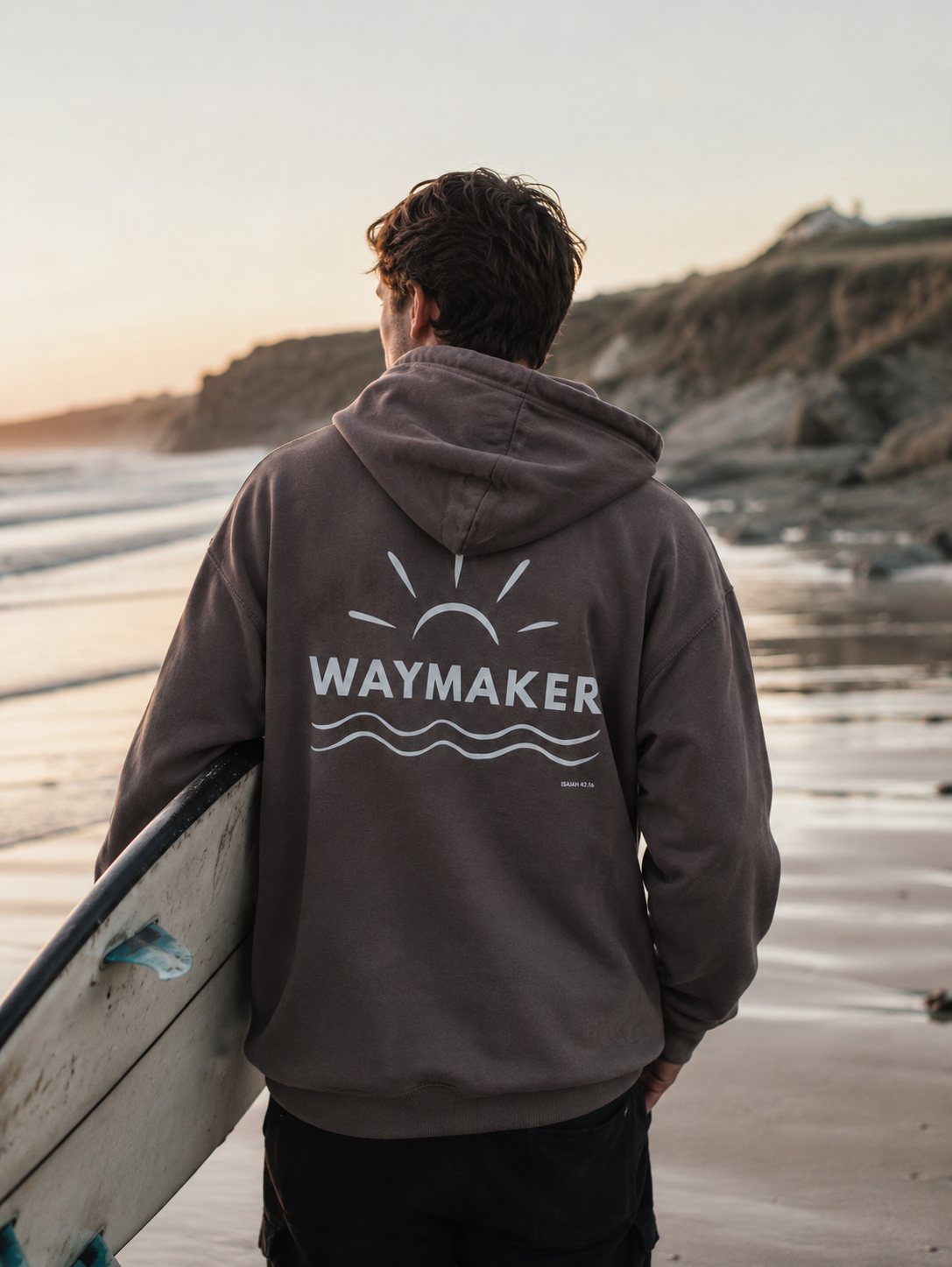 Waymaker Unisex Hoodie Christian hoodie, beach lifestyle shot | Face of Faith faith apparel